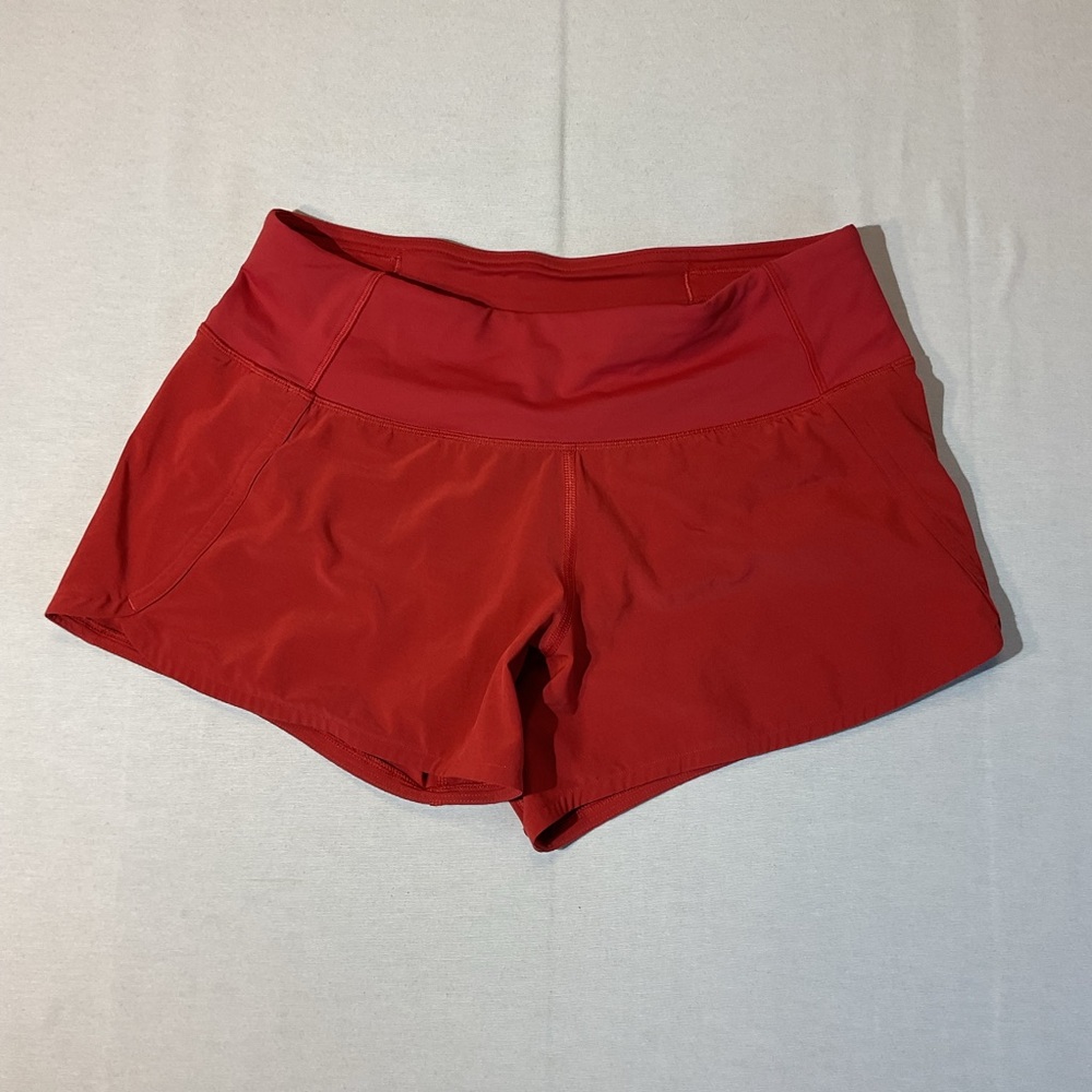 Lululemon Red/Orange Speed Up Athletic Shorts, Size‎ 4, Zip back Pocket Sport